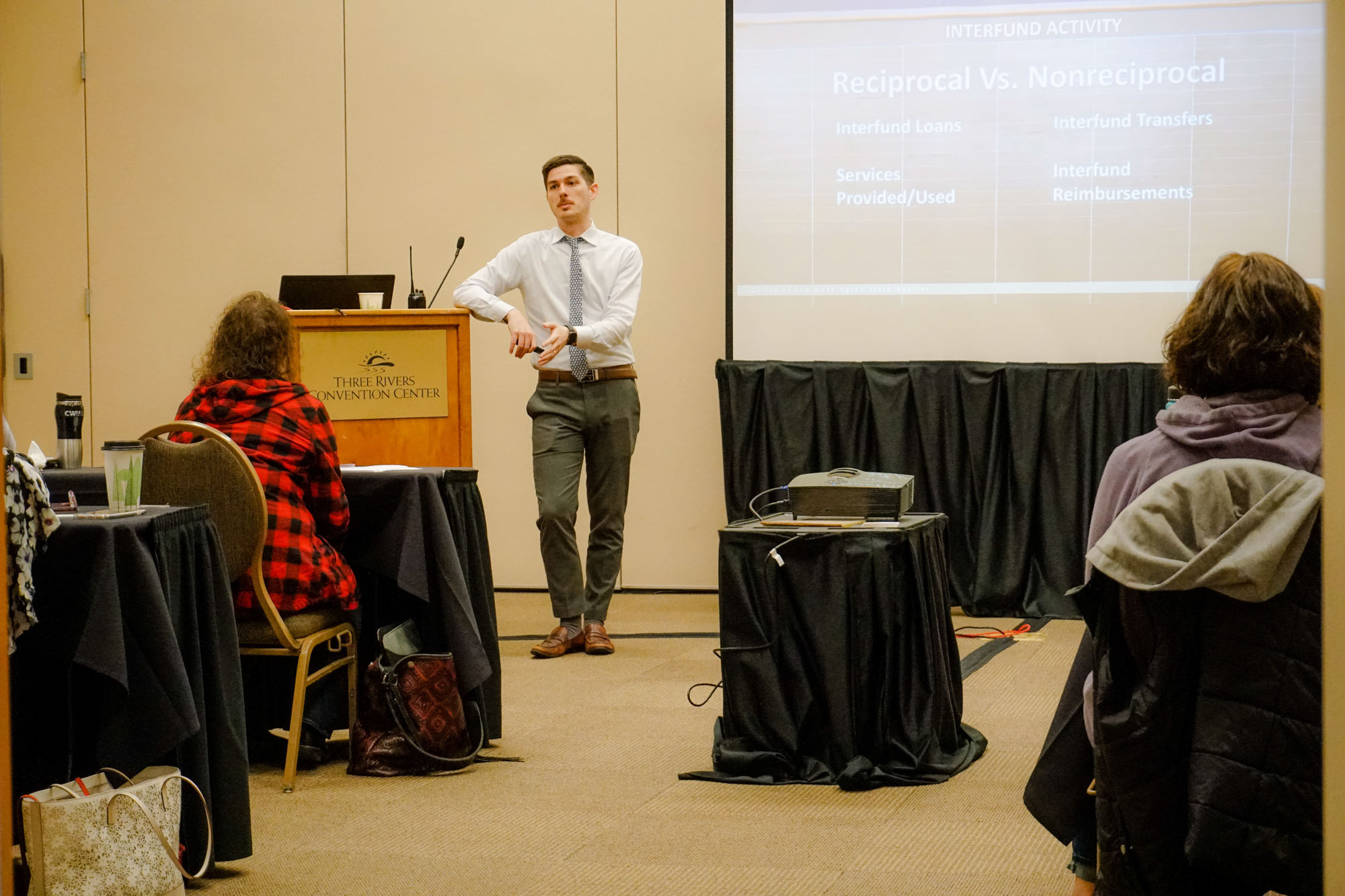 Person presenting about reciprocal vs. nonreciprocal funds.