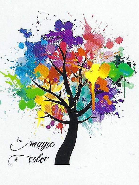 Silhouette tree with colorful paint splashes