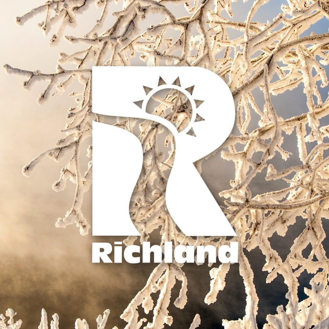 Frost-covered branches with Richland logo.