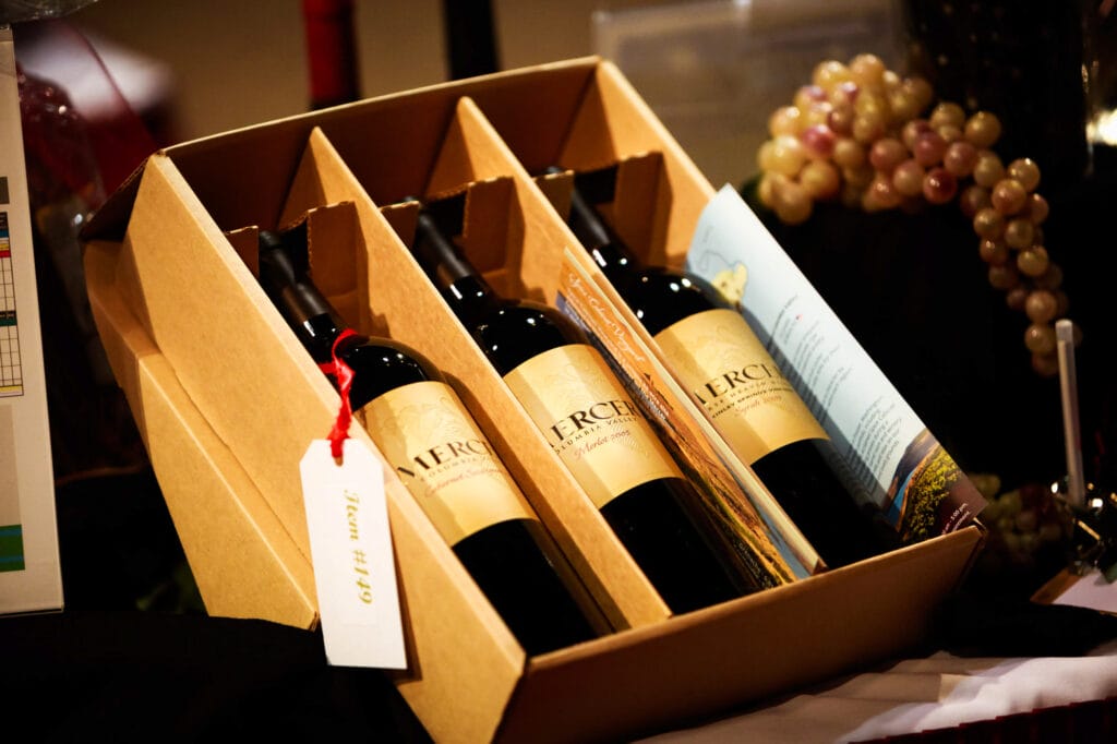 Box of wine bottles with tag